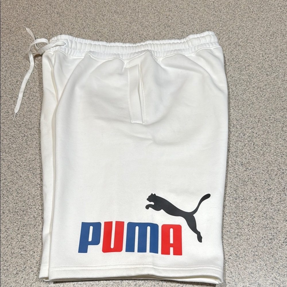 Puma Men's White Athletic Shorts with Blue and Red Logo